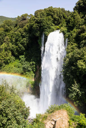 Marmore waterfall in Umbria region, Italy. Amazing cascade splashing into nature with trees and rocks.の写真素材