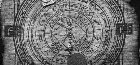 Ancient esoteric witchcraft background. Occultims and paganism old symbol, with mysterious runes and alphabet.の写真素材