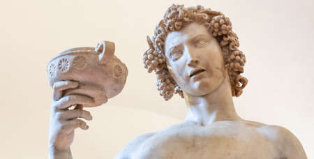 Florence, Italy - Circa June 2021: Bacchus by Michelangelo Buonarroti, 1501. Ancient sculpture made of white marbleのeditorial素材