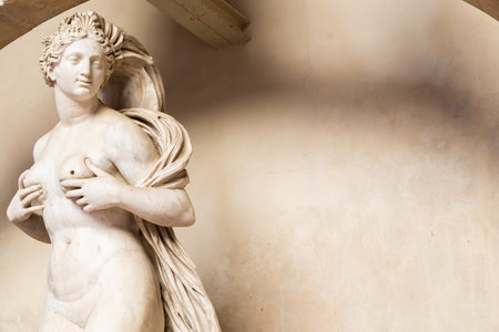 Florence, Italy - circa July 2021. Sensual naked woman statue. Beauty figure made of stone.のeditorial素材