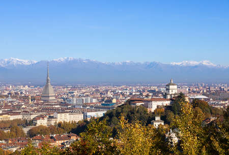 Turin, Italy - Circa November 2021: panorama with Alps and Mole Antonelliana,. Skyline of the symbol of Piedmont Region withi Monte dei Cappuccini - Cappuccini's Hill. Sunrise light.のeditorial素材