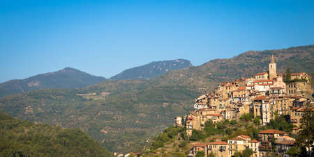 APRICALE, ITALY - CIRCA AUGUST 2020: traditional old village made of stones located in Italian Liguria region  with blue sky and copyspaceのeditorial素材