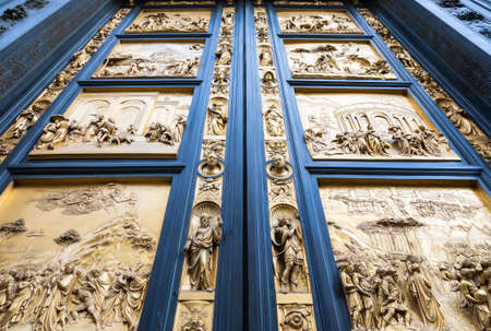 Florence Gate of Paradise: main old door of the Baptistry of Florence - Battistero di San Giovanni - located in front of the Cathedral of Santa Maria del Fioreの写真素材