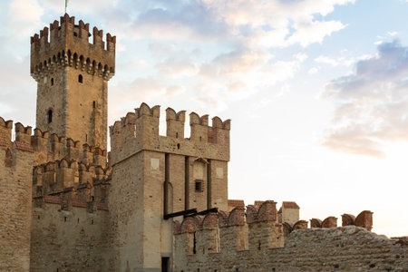 Sirmione, Italy - June 2022: Sirmione castle on Garda lake. Scenic medieval building on the waterのeditorial素材