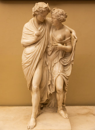 Florence, Italy - 27 June 2023: Bacchus and Ariadne, by Francesco Carradori, 1777. Lovers statue, classic romantic sculptureのeditorial素材