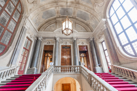 Turin, Italy - Circa January 2022: red carpet in Royal Palace - luxury elegant marble stairwayのeditorial素材