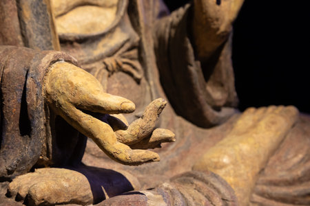 Ancient Buddha hand. Concept of energy, ethnic, harmony, meditation, peaceのeditorial素材