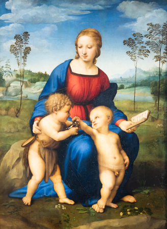 Florence, Italy - June 2022: Madonna and Child with Young St John the Baptist - also named Madonna...
