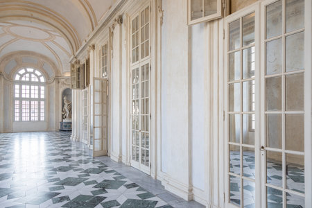 Venaria Reale, Italy - 16 July 2023: luxury gallery perspective, decorative marble, indoor, nobody, Royal Palace. Italy travel destination.のeditorial素材