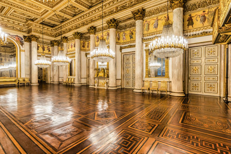 Turin, Italy - November 17, 2023: baroque ballroom interior in Royal Palace, 1842. Luxury marble, antique chandelier, classic floorのeditorial素材