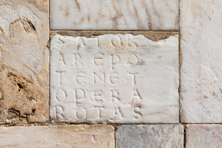 Facade of Siena Cathedral, Italy. The magic Sator square, esoteric word, Latin palindrome, hidden on a marble stoneのeditorial素材