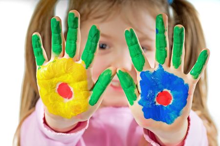 Young girl with hands paintedの写真素材