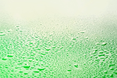 The close-up water drop waveの写真素材