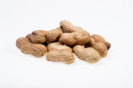 Bunch of peanuts, isolated on white background の写真素材