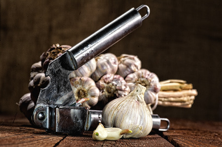 String of garlic on wooden backgroundの写真素材