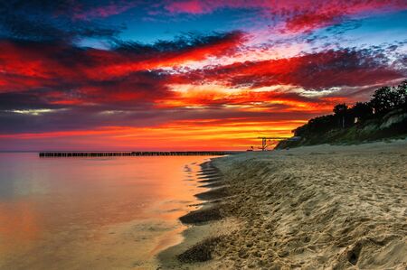 Sunset on the beach at Baltic Seaの写真素材