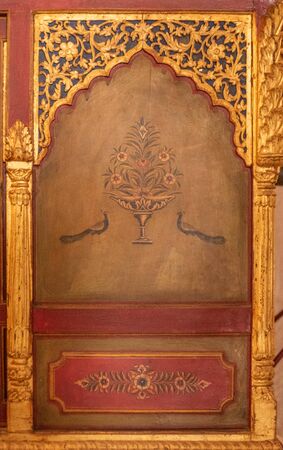Decorative art work on a palanquin painted in gold and natural pigments by an unknown artist.のeditorial素材