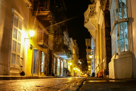 Typical street scene in Cartagena, Colombia of a street with old historic colonial housesの写真素材
