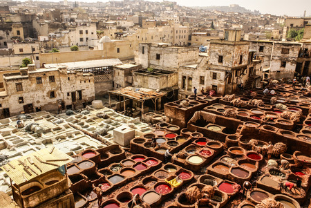Tanneries of Fes, Morocco, Africa Old tanks of the Fez's tanneries with color paint for leather, Morocco, Africaのeditorial素材