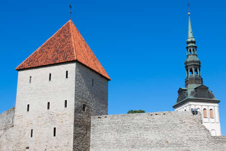 View of fortress towers and church on sky background. Tallinn. Estoniaのeditorial素材