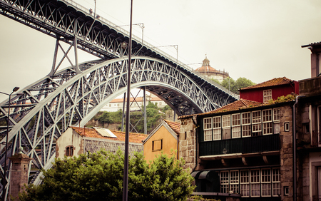 view of Porto in Portugal with the famous bridge over the river Douro from the famous architect Eiffelのeditorial素材