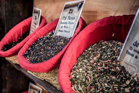 Spices, seeds and tea sold in a traditional market in Granada, Spainの写真素材