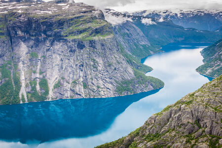 Beautiful norwegian landscape with mountains on the the way to trolltungaの写真素材