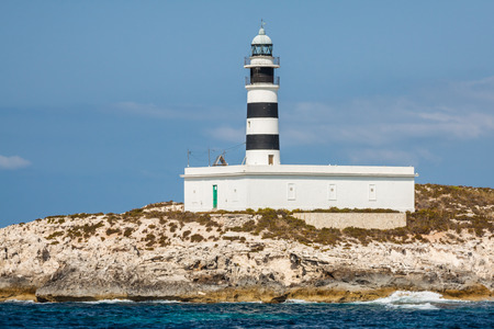 Lighthouse on Isla de Es Penjats near Ibiza, Balearic Islands, Spainの写真素材