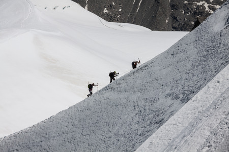 Mont Blanc, Chamonix, French Alps. France. - tourists climbing up the mountainのeditorial素材