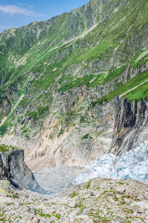 Hiking to Argentiere glacier with the view on the massif des Aiguilles Rouges in French Alpsの写真素材