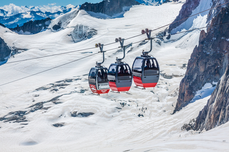 MONT BLANC, ITALY - AUGUST, 19: the highest cable way in Europe, reaching 3.842 meter at Peak Aiguille, electric engine, on the Italian side on August 19, 2013 on Mont Blanc, Italyのeditorial素材