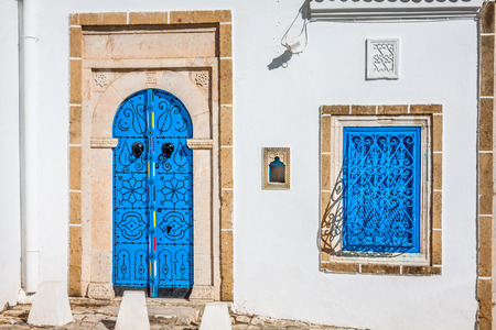 Typical local door of traditional home; Tunis; Tunisiaの写真素材