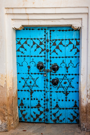 Traditional entrance door of a house in Gafsa,Tunisiaのeditorial素材