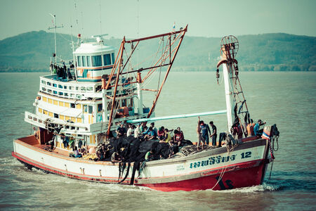 Phuket,Thailand,December 8,2013: Wooden local fisher boat. Phuket island.のeditorial素材