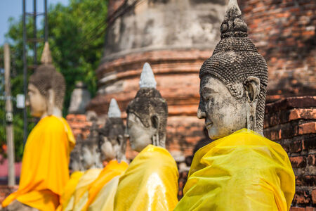 Buddha statues in Ayutthaya,Thailand. In 1767, the city was destroyed by the Burmese army. The ruins are preserved in Ayutthaya historical park, which is recognized as a UNESCO World Heritage Site.のeditorial素材