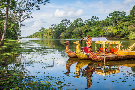 Thai traditional  boats on the lake near,Bayon temple in Angkor Thom, Siemreap, Cambodia.の写真素材