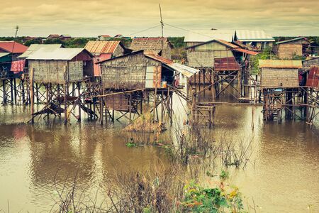 Homes on stilts on the floating village of Kampong Phluk Tonle Sap lakeSiem Reap province Cambodiaの写真素材