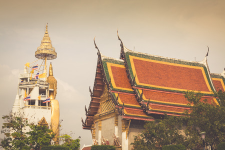 Wat Intharawihan buddhist temple in Bangkok holds the tallest standing buddha in the world.