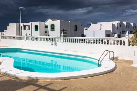 View of the swimming pool in the urbanization Playa Blanca,Lanzaroteのeditorial素材