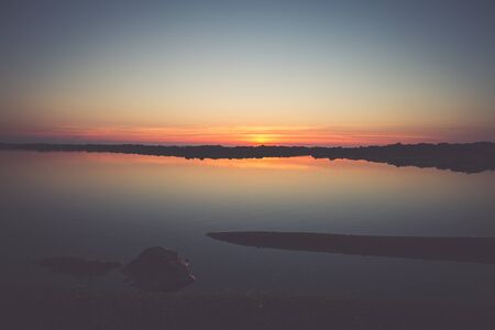 Sunset on the beach with beautiful skyの写真素材