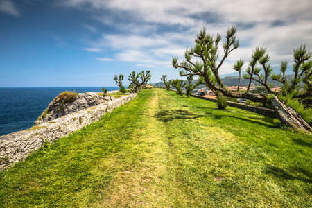 Cliff area in the resort town of Llanes, Spainの写真素材