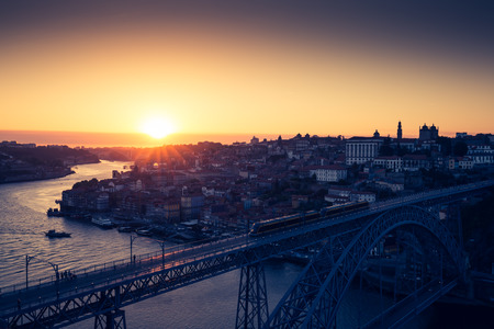 Night view of the historic city of Porto, Portugal with the Dom Luiz bridgeの写真素材