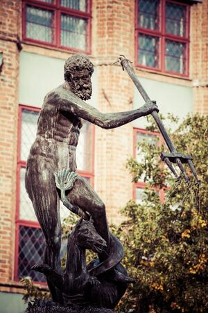 Fountain of the Neptune in old town of Gdansk, Polandの写真素材