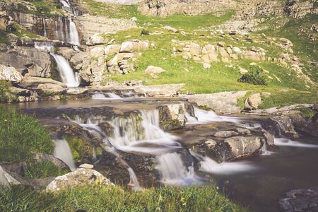 Waterfall de cotatuero under Monte Perdido at Ordesa Valley Aragon Huesca Pyrenees of Spainの写真素材