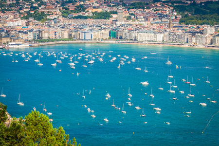 Boats and speedboats parked offshoreの写真素材