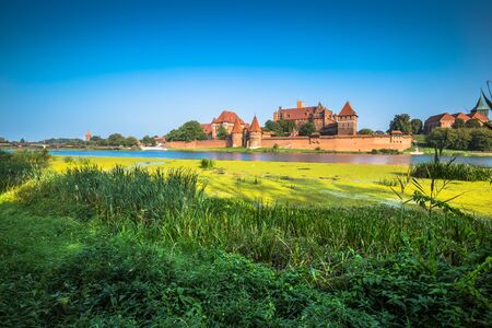 Malbork Castle at Nogat River in Poland, Europeの写真素材