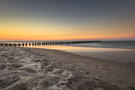 Baltic sea at beautiful sunrise in Poland beach.の写真素材