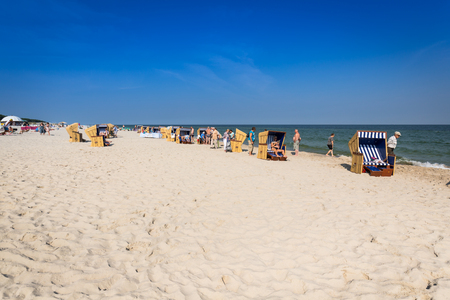 Jurata,Poland-September 9,2016:Wicker chairs on Jurata beach on sunny summer day, Hel peninsula, Baltic Sea, Polandのeditorial素材
