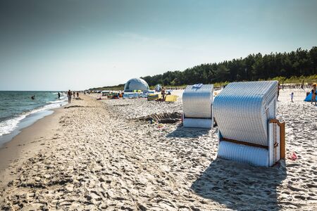 Jurata,Poland-September 9,2016:Wicker chairs on Jurata beach on sunny summer day, Hel peninsula, Baltic Sea, Polandのeditorial素材