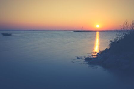 Sunset on the Bay of Puckの写真素材
